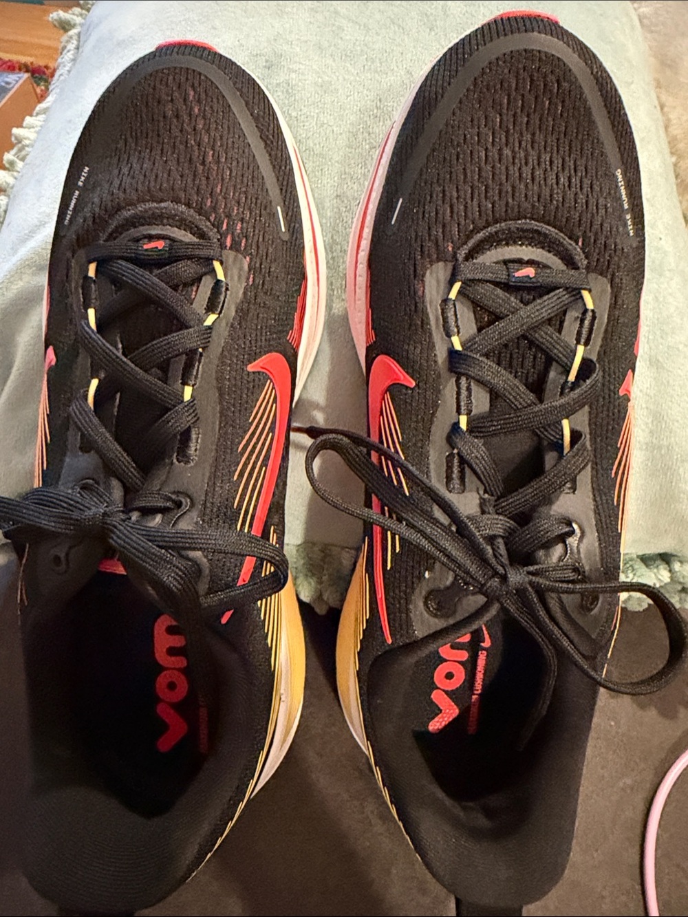Back to school shoes
Nike Black Running Sneakers with Red and Yellow Accents